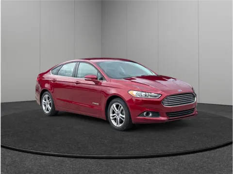Red 2016 Ford Fusion SE Hybrid Sedan 4D for sale in Jacksonville, FL