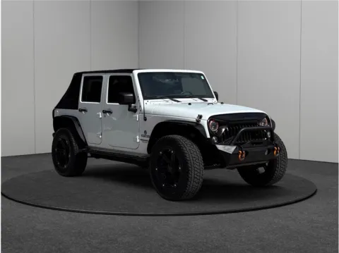 White 2016 Jeep Wrangler Unlimited Sport SUV 4D for sale in Jacksonville, FL