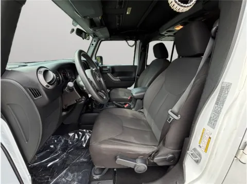 Photos of 2016 Jeep Wrangler Unlimited Sport SUV 4D for sale in Jacksonville, FL at Merit Auto Group Atlantic