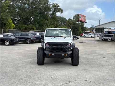 Another view of 2016 Jeep Wrangler Unlimited Sport SUV 4D for sale in Jacksonville, FL at Merit Auto Group Atlantic