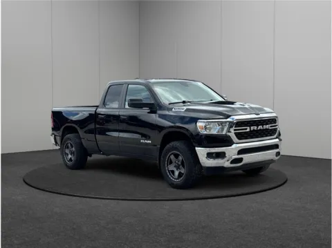 Black 2022 Ram 1500 Quad Cab Big Horn Pickup 4D 6 1/3 ft for sale in Jacksonville, FL