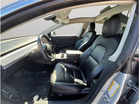 Photos of 2018 Tesla Model 3 Long Range Sedan 4D for sale in Jacksonville, FL at Merit Auto Group Atlantic