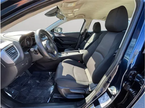 Photos of 2018 Mazda MAZDA3 Sport Sedan 4D for sale in Jacksonville, FL at Merit Auto Group Atlantic