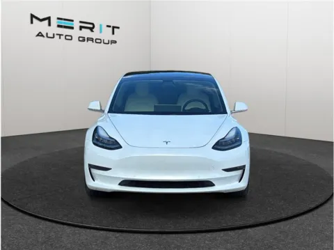 Another view of 2019 Tesla Model 3 Long Range Sedan 4D for sale in Jacksonville, FL at Merit Auto Group Atlantic