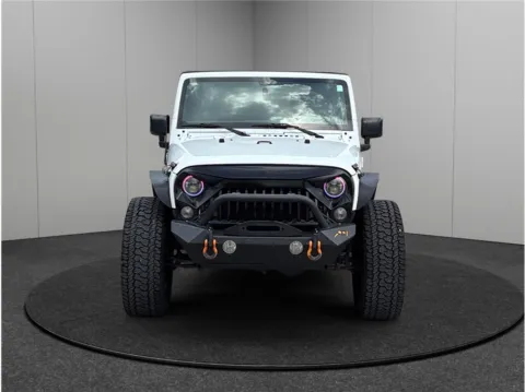 Another view of 2016 Jeep Wrangler Unlimited Sport SUV 4D for sale in Jacksonville, FL at Merit Auto Group Atlantic