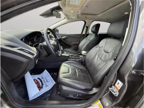 Photos of 2015 Ford Focus Titanium Hatchback 4D for sale in Jacksonville, FL at Merit Auto Group Atlantic