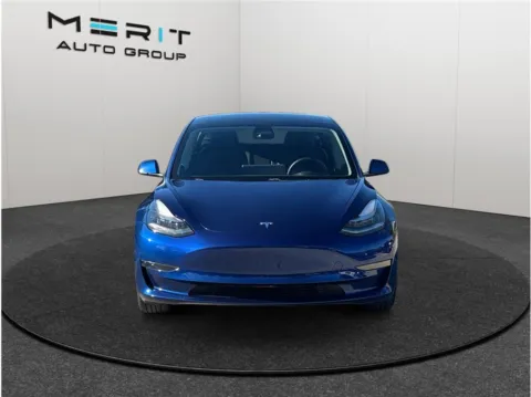 Another view of 2021 Tesla Model 3 Standard Range Plus Sedan 4D for sale in Jacksonville, FL at Merit Auto Group Atlantic