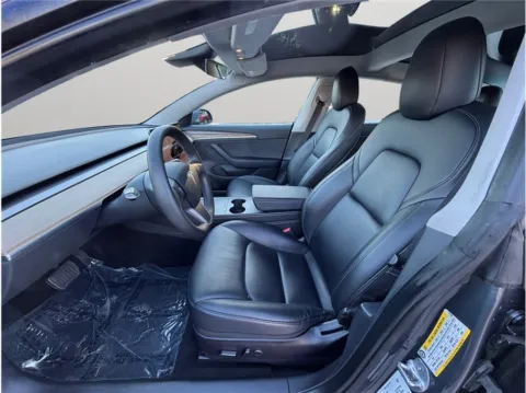 Photos of 2022 Tesla Model 3 Long Range Sedan 4D for sale in Jacksonville, FL at Merit Auto Group Atlantic