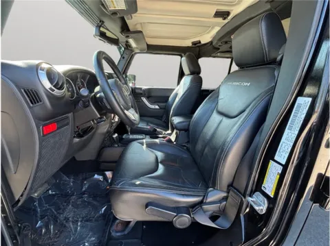 Photos of 2014 Jeep Wrangler Unlimited Rubicon X Sport Utility 4D for sale in Jacksonville, FL at Merit Auto Group Atlantic