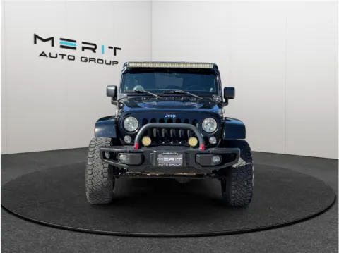 Another view of 2014 Jeep Wrangler Unlimited Rubicon X Sport Utility 4D for sale in Jacksonville, FL at Merit Auto Group Atlantic