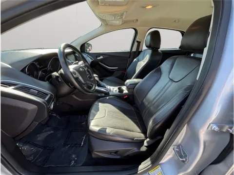 Photos of 2014 Ford Focus Titanium Hatchback 4D for sale in Jacksonville, FL at Merit Auto Group Atlantic