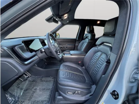 Photos of 2023 Rivian R1T Adventure Pickup 4D 4 1/2 ft for sale in Jacksonville, FL at Merit Auto Group Atlantic