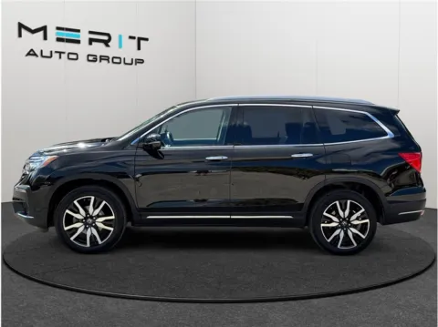 More photos of 2022 Honda Pilot Touring Sport Utility 4D at Merit Auto Group Atlantic, FL