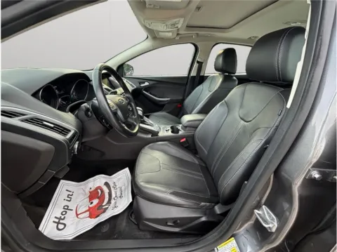 Photos of 2014 Ford Focus Titanium Sedan 4D for sale in Jacksonville, FL at Merit Auto Group Atlantic