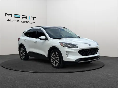 White 2020 Ford Escape Titanium Hybrid Sport Utility 4D for sale in Jacksonville, FL