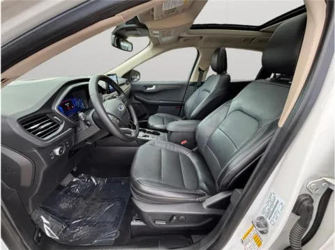 Photos of 2020 Ford Escape Titanium Hybrid Sport Utility 4D for sale in Jacksonville, FL at Merit Auto Group Atlantic