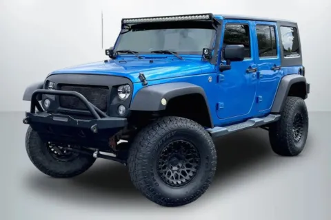Blue 2015 Jeep Wrangler Unlimited Sport SUV 4D for sale in Janesville, WI