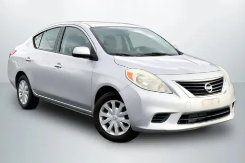 Photos of 2012 Nissan Versa SV Sedan 4D for sale in Janesville, WI at Cool Car Guys