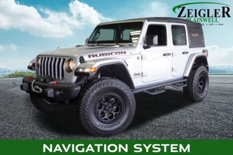 Silver 2023 Jeep Wrangler Rubicon for sale in Plainwell, MI
