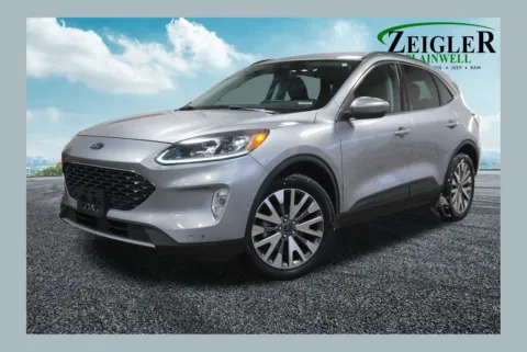 Silver 2021 Ford Escape Hybrid Titanium for sale in Plainwell, MI