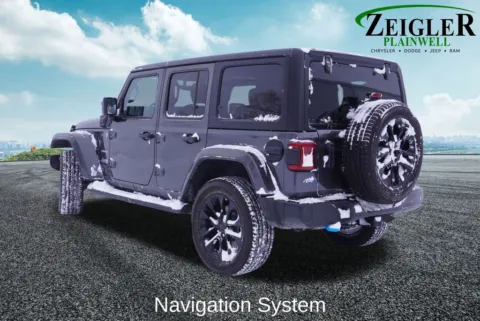 Photos of 2023 Jeep Wrangler Sahara 4xe for sale in Plainwell, MI at Zeigler Chrysler Dodge Jeep Ram of Plainwell