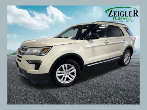 Beige 2018 Ford Explorer XLT for sale in Plainwell, MI
