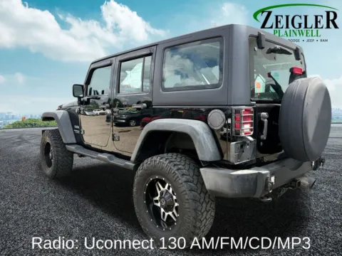 Another view of 2014 Jeep Wrangler Unlimited Sport for sale in Plainwell, MI at Zeigler Chrysler Dodge Jeep Ram of Plainwell