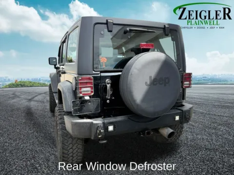More photos of 2014 Jeep Wrangler Unlimited Sport at Zeigler Chrysler Dodge Jeep Ram of Plainwell, MI