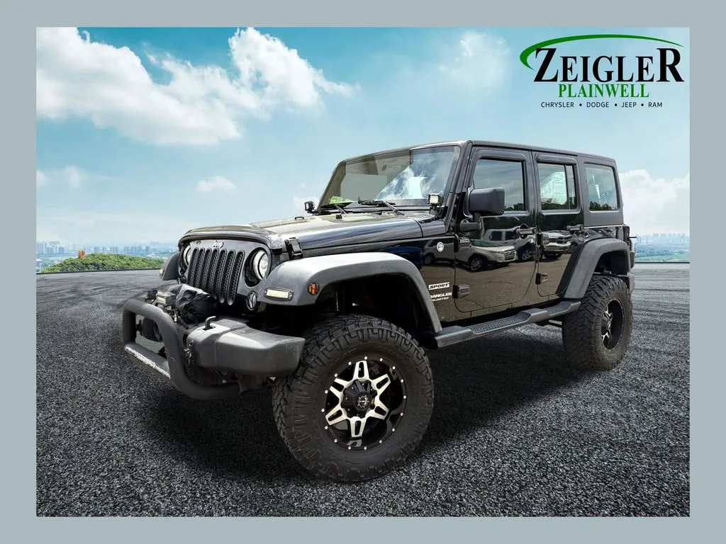Black 2014 Jeep Wrangler Unlimited Sport for sale in Plainwell, MI