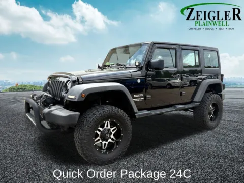 Photos of 2014 Jeep Wrangler Unlimited Sport for sale in Plainwell, MI at Zeigler Chrysler Dodge Jeep Ram of Plainwell