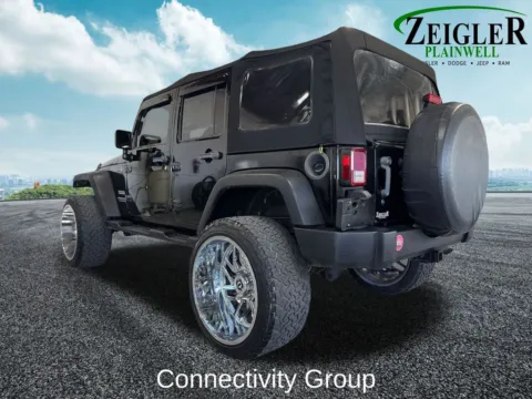 Another view of 2013 Jeep Wrangler Unlimited Sport for sale in Plainwell, MI at Zeigler Chrysler Dodge Jeep Ram of Plainwell