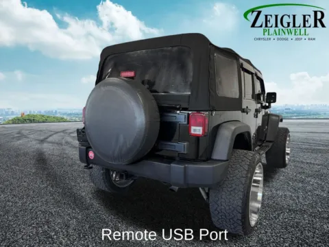 More photos of 2013 Jeep Wrangler Unlimited Sport at Zeigler Chrysler Dodge Jeep Ram of Plainwell, MI