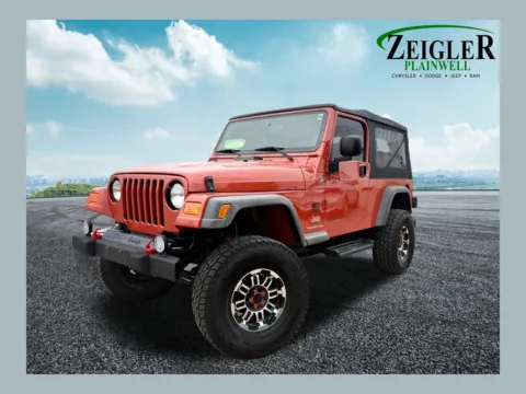 Orange 2005 Jeep Wrangler Unlimited for sale in Plainwell, MI
