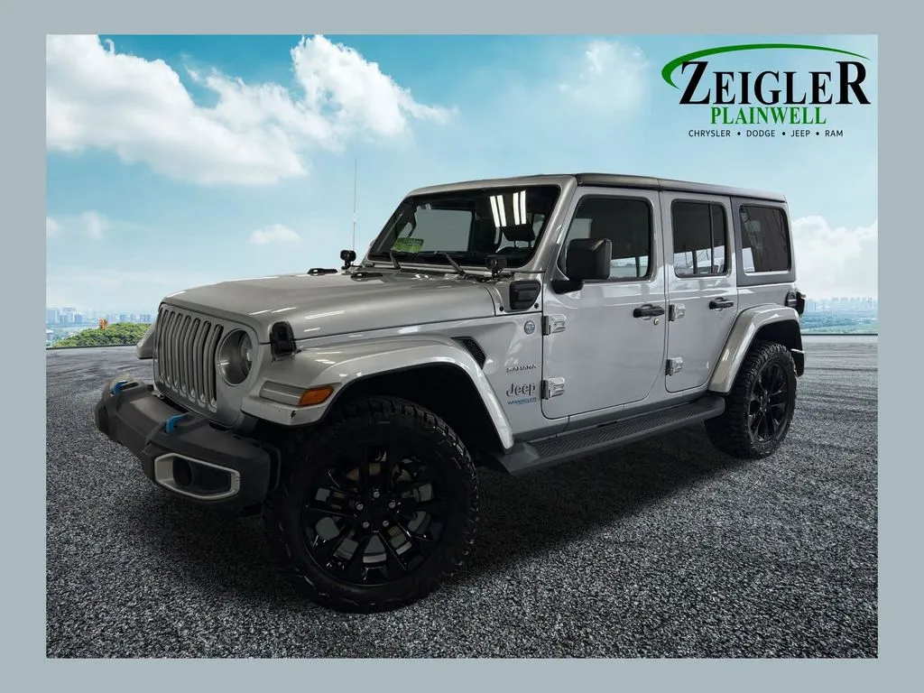 Silver 2022 Jeep Wrangler Unlimited Sahara 4xe for sale in Plainwell, MI