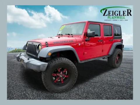 Red 2016 Jeep Wrangler Unlimited Sport for sale in Plainwell, MI