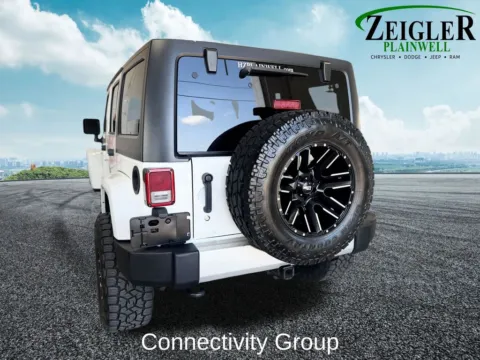 More photos of 2013 Jeep Wrangler Unlimited Sahara at Zeigler Chrysler Dodge Jeep Ram of Plainwell, MI