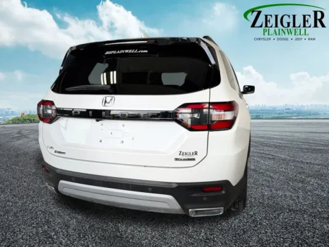 More photos of 2023 Honda Pilot Touring at Zeigler Chrysler Dodge Jeep Ram of Plainwell, MI
