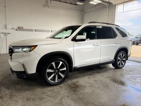 Photos of 2023 Honda Pilot Touring for sale in Plainwell, MI at Zeigler Chrysler Dodge Jeep Ram of Plainwell