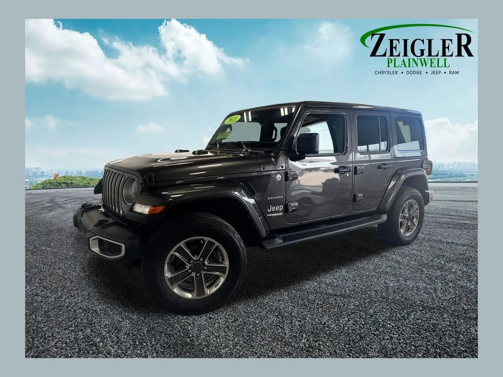Gray 2021 Jeep Wrangler Unlimited Sahara for sale in Plainwell, MI