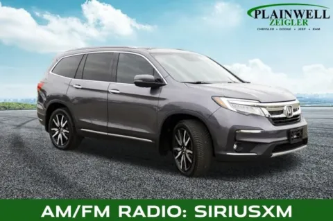 More photos of 2020 Honda Pilot Touring at Zeigler Chrysler Dodge Jeep Ram of Plainwell, MI