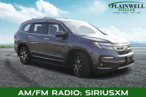 More photos of 2021 Honda Pilot Touring at Zeigler Chrysler Dodge Jeep Ram of Plainwell, MI