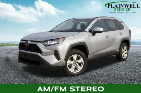Silver 2021 Toyota RAV4 Hybrid LE for sale in Plainwell, MI