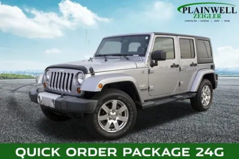 Silver 2013 Jeep Wrangler Unlimited Sahara for sale in Plainwell, MI