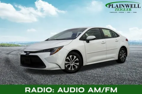 White 2022 Toyota Corolla Hybrid LE for sale in Plainwell, MI