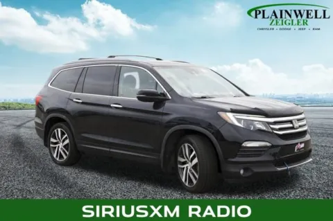 More photos of 2018 Honda Pilot Touring at Zeigler Chrysler Dodge Jeep Ram of Plainwell, MI