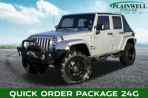 Silver 2009 Jeep Wrangler Unlimited Sahara for sale in Plainwell, MI
