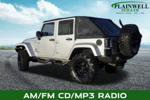 Photos of 2009 Jeep Wrangler Unlimited Sahara for sale in Plainwell, MI at Zeigler Chrysler Dodge Jeep Ram of Plainwell
