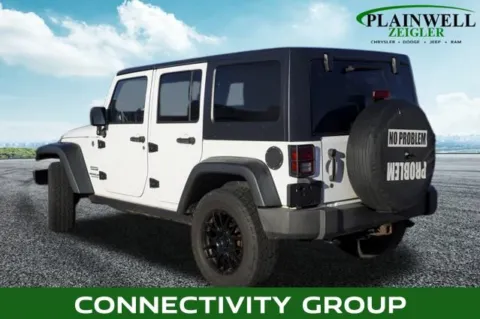 Photos of 2013 Jeep Wrangler Unlimited Sport for sale in Plainwell, MI at Zeigler Chrysler Dodge Jeep Ram of Plainwell