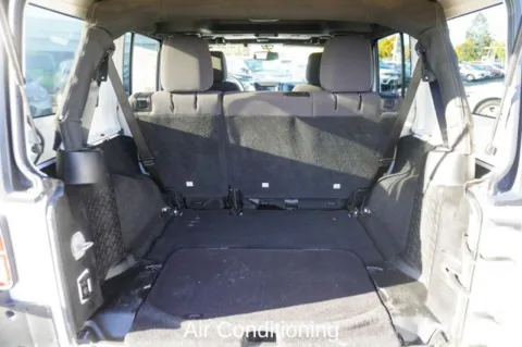 More photos of 2013 Jeep Wrangler Unlimited Sport at Zeigler Chrysler Dodge Jeep Ram of Plainwell, MI