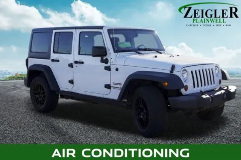 More photos of 2013 Jeep Wrangler Unlimited Sport at Zeigler Chrysler Dodge Jeep Ram of Plainwell, MI
